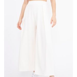 Corinne Jojo pleat pants NWT